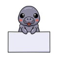 Cute baby manatee cartoon with blank sign Royalty Free Stock Photo