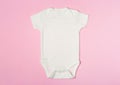 Cute baby onesie on color background