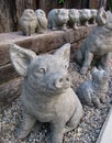Cute baby pig leads fun lineup of stone garden animals