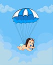 Cute baby in pilot hat falling down with blue parachute in sky