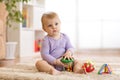 Cute baby playing educationa toys at home or kindergarten Royalty Free Stock Photo