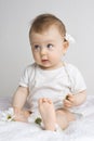 Cute baby playing with flowers Royalty Free Stock Photo