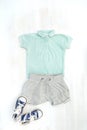 Cute baby romper,bodysuit,shorts,sneakers. Set of kids,childrens clothes,clothing and accessories in pastel blue color. Newborn, Royalty Free Stock Photo