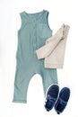 Cute baby romper,bodysuit,sneakers with jumper. Set of kids,childrens clothes and accessories in pastel blue gender Royalty Free Stock Photo
