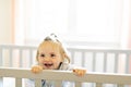 Cute baby baby on the baby room crib