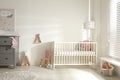 Cute baby room with crib and decor elements Royalty Free Stock Photo