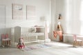 Cute baby room with crib and decor elements Royalty Free Stock Photo