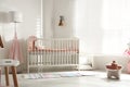 Cute baby room with crib and decor elements Royalty Free Stock Photo