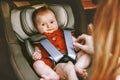 Cute baby in safety car seat family road trip vacations Royalty Free Stock Photo