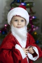 Cute baby in santa costume