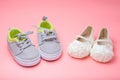 Cute baby shoes for kids on pink background. Royalty Free Stock Photo