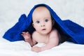 Cute baby after shower with blue towel on head Royalty Free Stock Photo