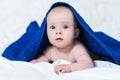 Cute baby after shower with blue towel on head Royalty Free Stock Photo