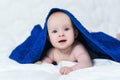 Cute baby after shower with blue towel on head Royalty Free Stock Photo