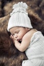 Cute baby sleeping on the fur Royalty Free Stock Photo