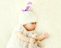 Cute baby sleeping on white bed at home close up Royalty Free Stock Photo