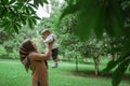 Cute baby smile when his mother lift him up