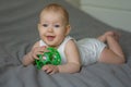 Cute Baby smiling and playing with toy Royalty Free Stock Photo