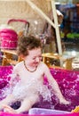 Cute baby splashing water