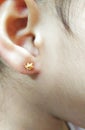 Cute baby star shaped baby top earings Royalty Free Stock Photo