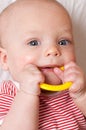 Cute baby with a teething ring Royalty Free Stock Photo