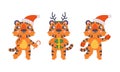 Cute baby tigers set. Funny orange striped jungle wildcat character in Santa Claus caps. Happy New Year cartoon vector Royalty Free Stock Photo