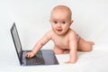 Cute baby typing on a laptop computer isolated on white Royalty Free Stock Photo