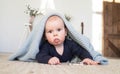 Cute baby under the blanket blanket Royalty Free Stock Photo