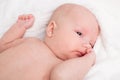 Cute baby wrapped into towels Royalty Free Stock Photo