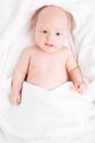 Cute baby wrapped into towels Royalty Free Stock Photo