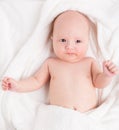 Cute baby wrapped into towels Royalty Free Stock Photo