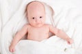 Cute baby wrapped into towels Royalty Free Stock Photo