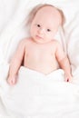 Cute baby wrapped into towels Royalty Free Stock Photo