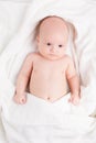 Cute baby wrapped into towels Royalty Free Stock Photo