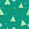 Cute background of Christmas trees and candy on the background