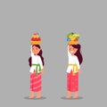 Cute Balinese Girl Bring Fruit Offerings For Rite Ceremony