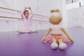 Cute little ballerina girl exercising at dance school Royalty Free Stock Photo