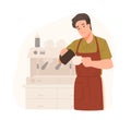 Cute barista making cappuccino at cafe or coffeeshop. Smiling young man in apron adds cream or milk in coffee. Male Royalty Free Stock Photo