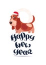 Cute Basset Dog In Santa Hat On Happy New Year Greeting Card Holiday Lettering Banner Royalty Free Stock Photo