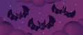 Cute bats flying in the night sky