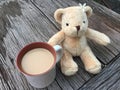 Cute bear doll with morning milk coffee