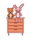 Cute bear and rabbit stuffed baby toys in drawer Royalty Free Stock Photo