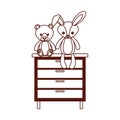 Cute bear and rabbit stuffed baby toys in drawer Royalty Free Stock Photo