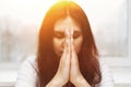 Cute beautiful girl folded her hands in prayer. A woman asks God for help Royalty Free Stock Photo