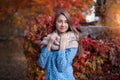 Cute beautiful smile portrait woman walking in red autumn park Royalty Free Stock Photo