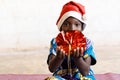 Cute Black African Christmas Girl Showing Present with Hands Happy and Joyful Royalty Free Stock Photo