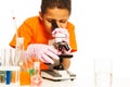 Cute black boy looking into microscope Royalty Free Stock Photo