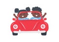 Cute black children in red car. Kids smiles and waves their hands. Boy and Girl ride a toy retro car Royalty Free Stock Photo