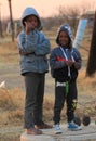 Cute black children from a suburb standing and smiling