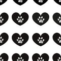 Cute black hearts and doodle white paws. Fabric design seamless pattern Royalty Free Stock Photo